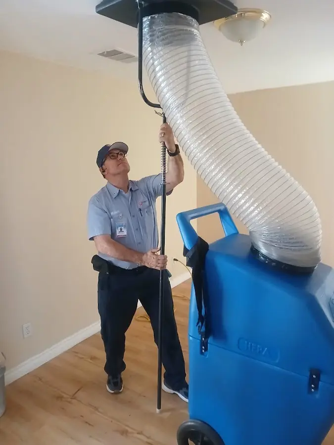 Mini Split Installation technician using HEPA equipment in St. Louis